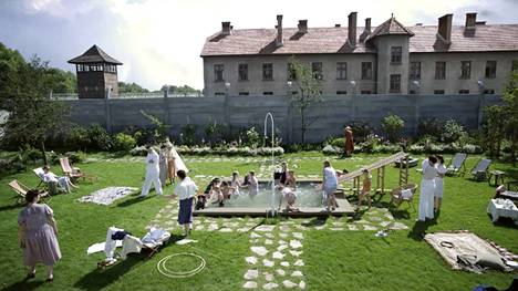 Nazi families spend a summer day in the garden near the concentration camp wall.  Jonathan Glazer's film The Zone of Interest is definitely worth seeing in the dark of a movie theater, but it is also available on streaming services.