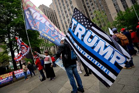 Donald Trump supporters gathered in front of the Manhattan courthouse on April 30.