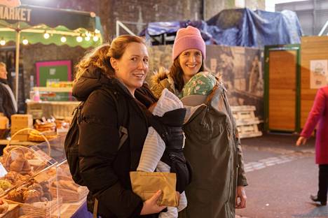 Becky Turner (left) and her friend Sarah Cahill were shopping in the market with their babies in London. 