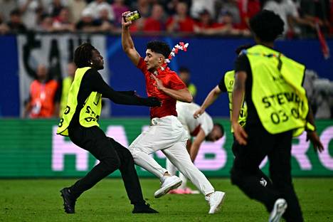 The match between the Czech Republic and Turkey was also interrupted when a spectator ran onto the field.