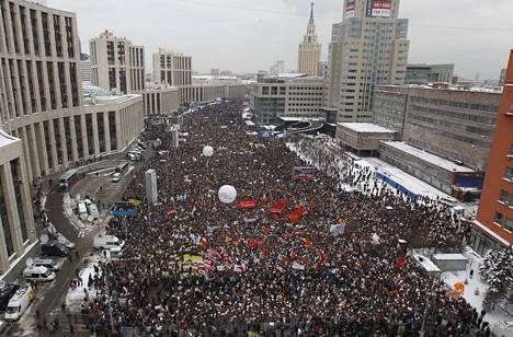 В декабре 2011 года десятки тысяч россиян протестовали в Москве против фальсификации выборов в Госдуму. Среди них была и Кира Ярмыш. Фото: Денис Синяков / Reuters