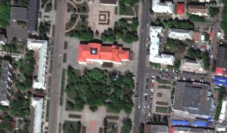 A satellite image of the Bahmut Theater and the surrounding shops and other buildings taken on May 8, 2022.