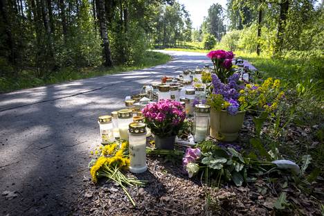 Flowers and candles near the place where the body was found.