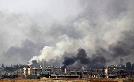Syyrian rajakaupunki Ras al-Ain savusi lokakuussa 2019, jolloin Turkki hyökkäsi kurdien hallitsemiin rajakaupunkeihin yhdessä liittolaistensa kanssa.