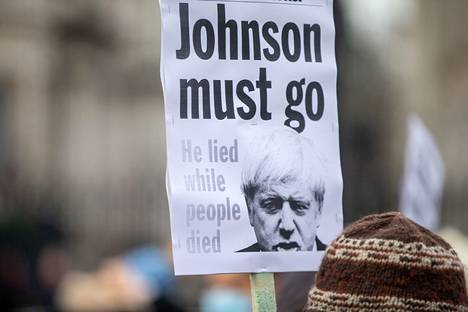 The poster in central London demands the resignation of Boris Johnson.