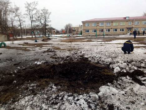 In the Luhansk region, Vrubivka village authorities published a picture of a projectile crater in the school yard.