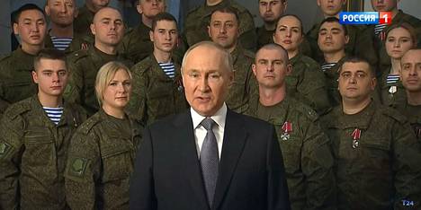 Речь Путина 31 декабря 2022 года стала рекордной. Скриншот с ТВ-экрана.