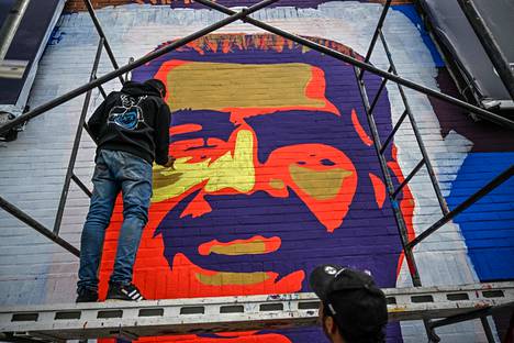 Nicolás Maduro's face was painted on a wall on the side of the road in Caracas on June 5.
