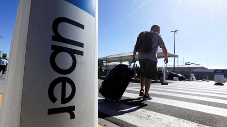 Matkustaja kulki Uber-kyltin ohi Los  Angelesin kansanvälisellä lentokentällä heinäkuun 10. päivänä 2022.