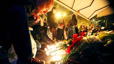 Parisians brought flowers and candles to the scene of the terrorist attacks in November 2015.