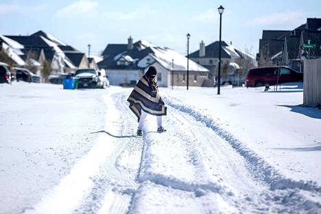 Snow covered the streets of Pflugerville, Texas in mid-February 2021.