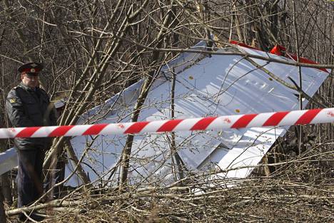 An employee of the Russian Ministry of Internal Affairs stood next to the Polish Tupolev Tu-154 that was destroyed in Smolensk on April 10, 2010.  Everyone on board died.