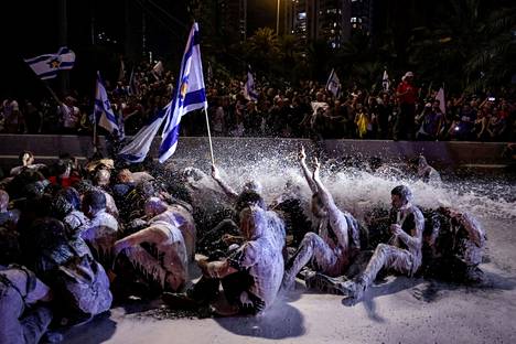 In Tel Aviv, police used a water cannon against protesters on Sunday.