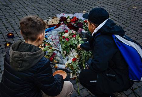 Two young fans brought flowers to Einár’s killing site on Friday.