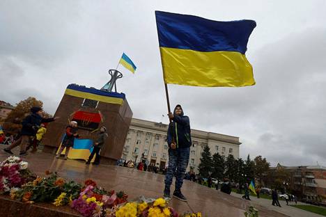 Ukrainian flags flew in the center of Kherson on Sunday.