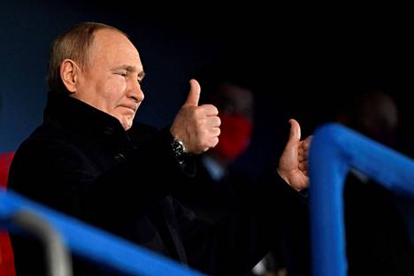 Vladimir Putin showed his thumbs up in the stands.