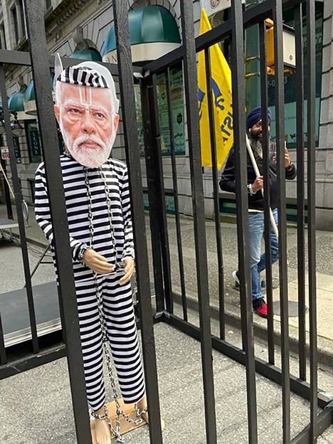 A cardboard picture of Indian Prime Minister Narendra Modi was locked behind bars at a Sikh activist rally in Vancouver, Canada.