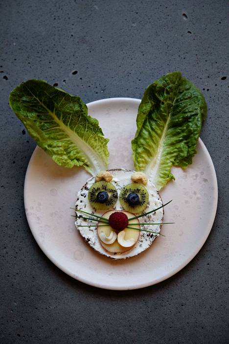 Bunny.  Place a round slice of bread on your face and the leaves of the romaine lettuce ears.  Eyes and mouth can be made from small tomatoes or berries.