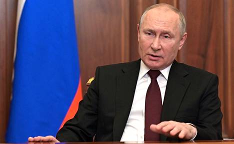 President Vladimir Putin giving his TV speech on Monday.