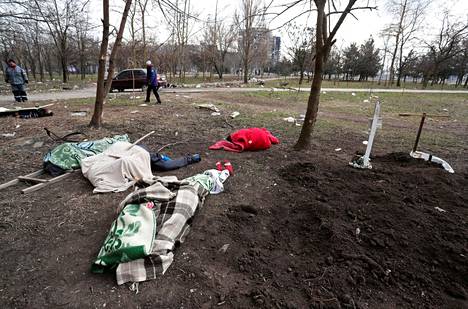 Victims of the war have been buried in the residential area in Mariupol.  Some were waiting to be buried last Friday. 