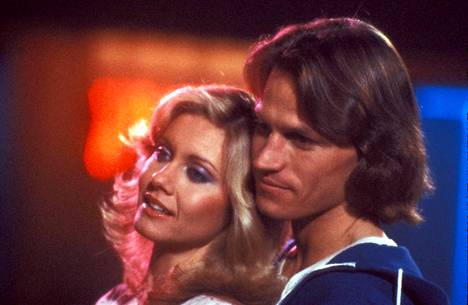 Olivia Newton-John ja Michael Beck näyttelevät pääosia elokuvassa Xanadu (1980).
