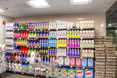 Several international brands catch the eye on the detergent shelf.  Next to it are the eggs in their brown cells. 