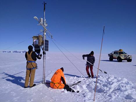 Weather station maintenance on a glacier in Antarctic summer 2023.