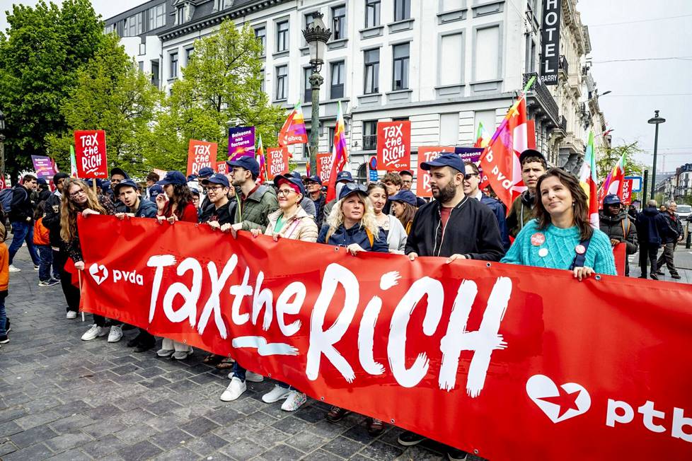 Brysselissä järjestetyssä marssissa vaadittiin kovempaa verotusta rikkaille.