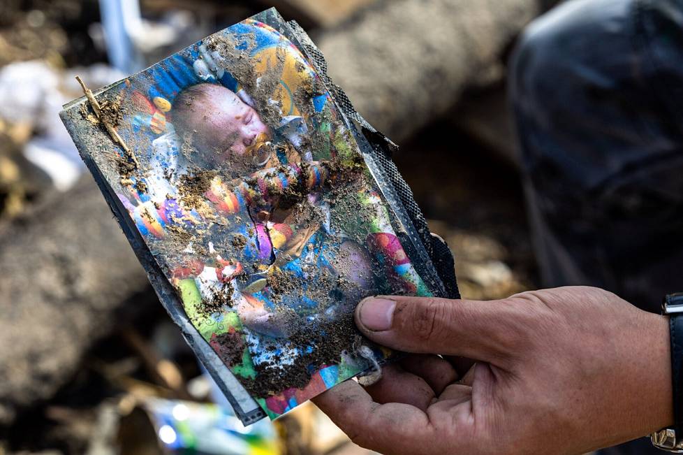 Vyacheslav Patlanj found a photo of his child as a baby at the bottom of the crater made by the missile.