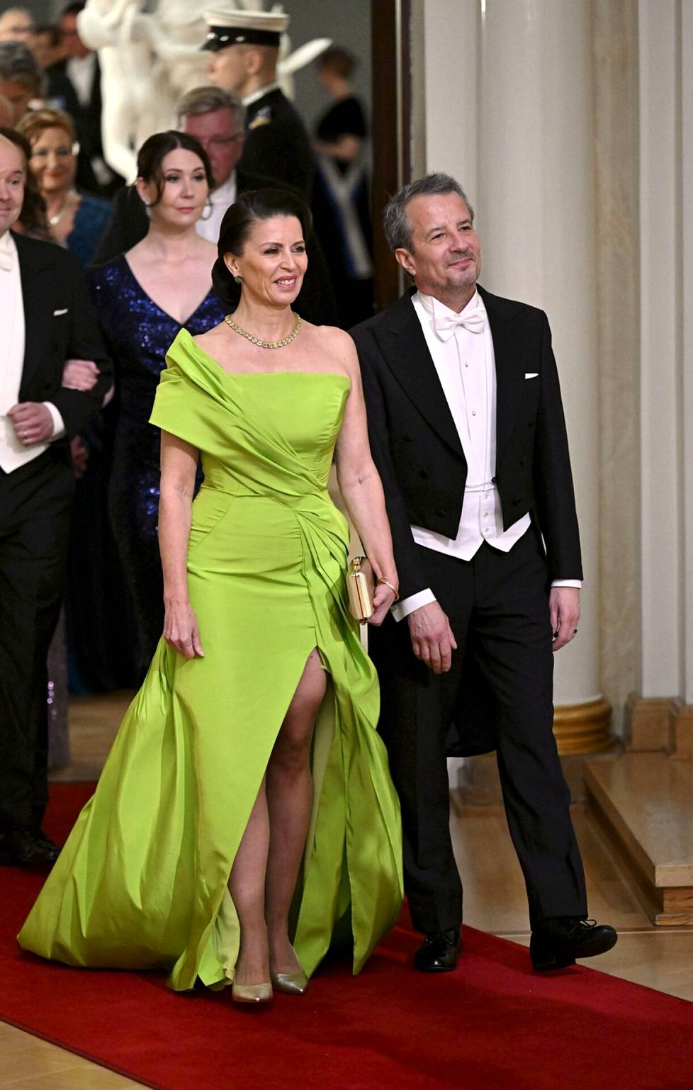 Actress Kristiina Haltu's costume is designed by designer Mert Otsamo.  In the green silk suit, the graphic print is shaped into a sleeve and a hem. 