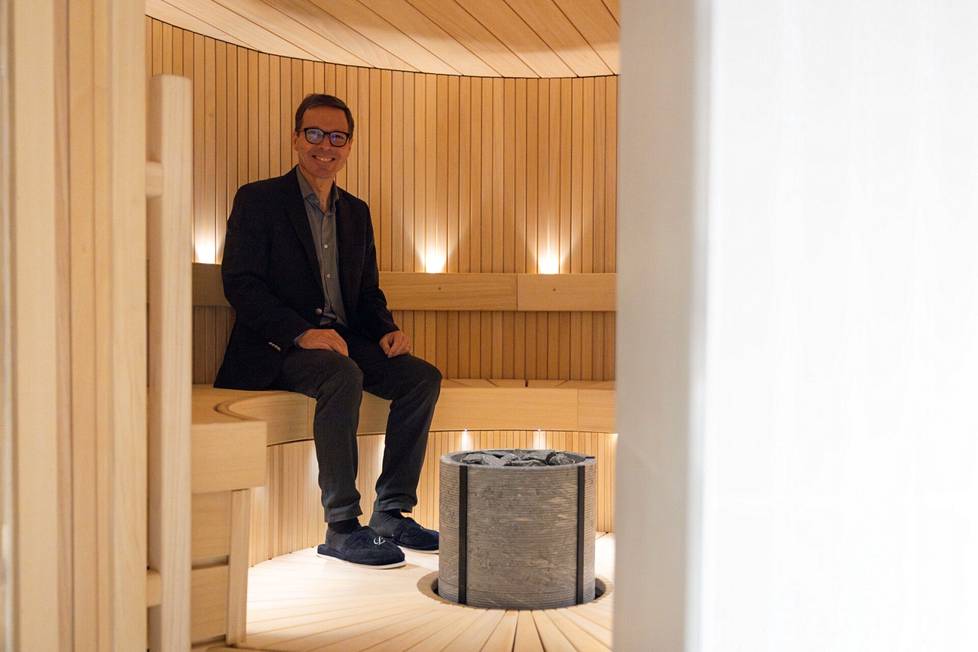 Architect Vesa Laukkanen sat in a round sauna, which is built in a former maid's staircase.