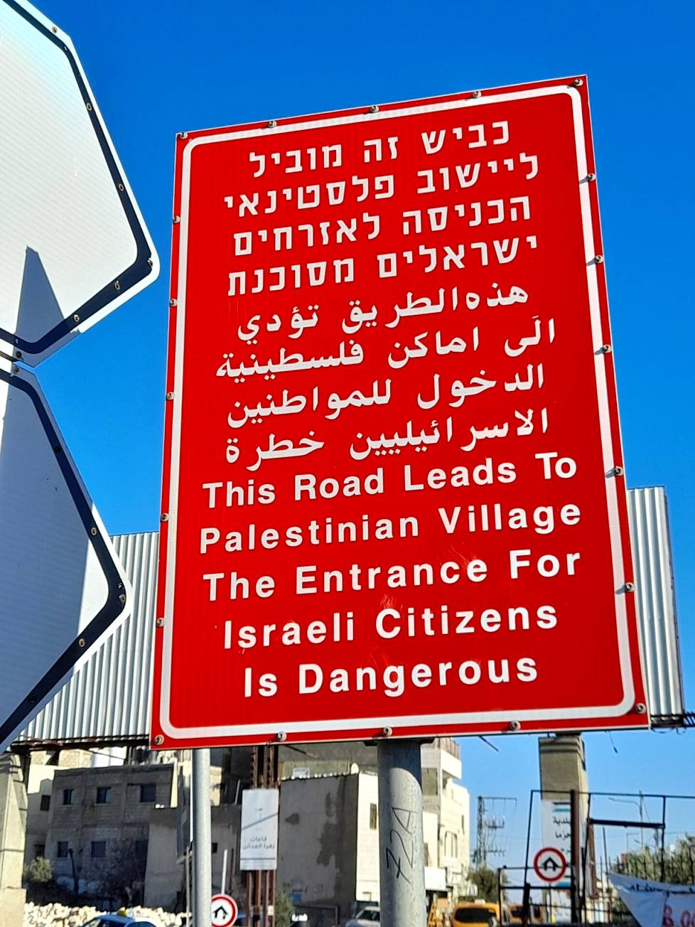 A sign warns Israelis not to go to a Palestinian village.