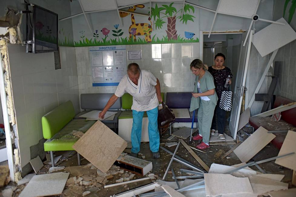 A doctor at the children's hospital examines the damage caused by the explosion.