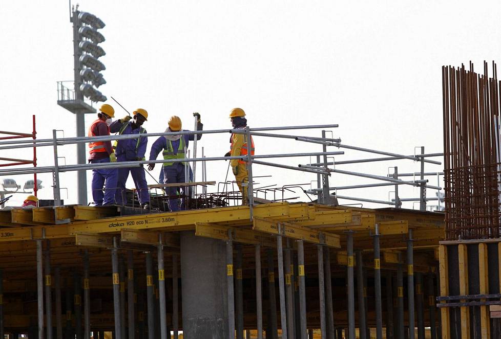 Siirtotyöläisiä Dohan rakennustyömaalla vuonna 2016.