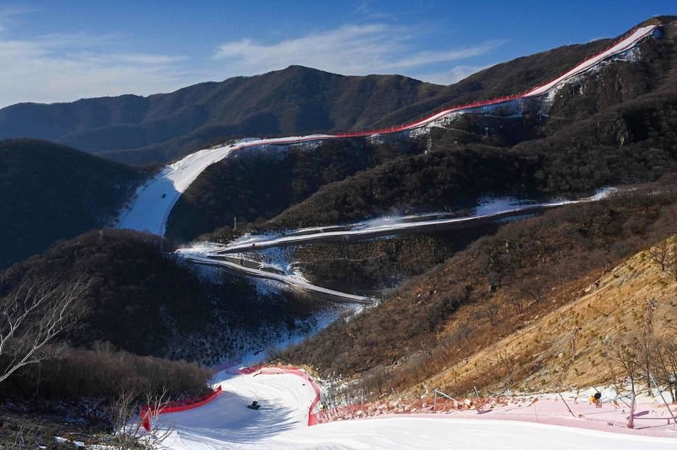 The slopes at Yanqing Ski Resort were snow-covered on Friday, although the mountains were otherwise without snow
