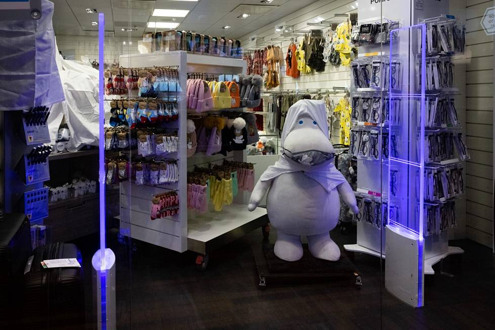 A lonely Moomin character in a closed store.