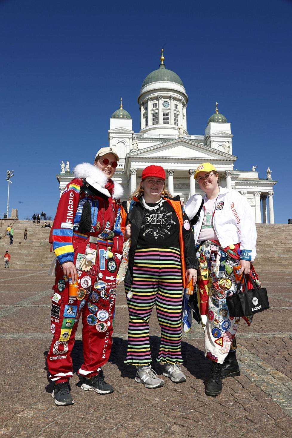 Students Meri Piippo (left), 22, Ida Toivonen, 24, and Alex Wallén, 22, were leaving Senatintor for Suomenlinna.