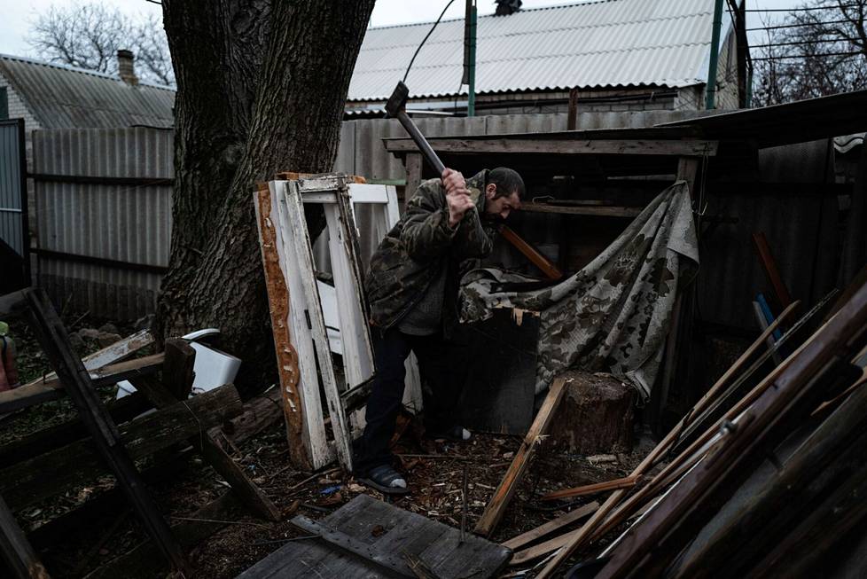 Denis Valentinovich supports himself with small chores, such as cutting down trees for nearby people in Pervomaisk, Ukraine. 