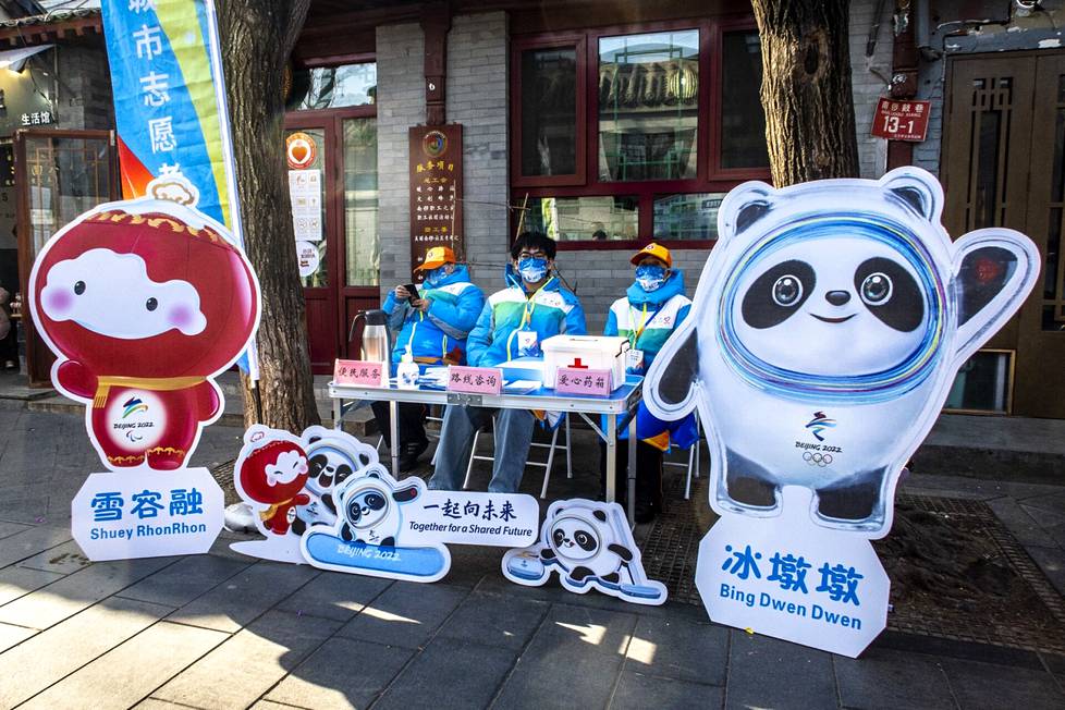 Pekingin hutongeissa turistikeskus markkinoi olympialaisia. Näitä paikkoja saa hiukan etsiä.