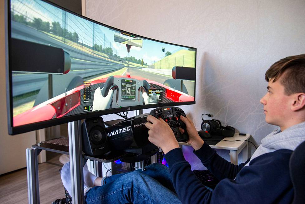 Tuukka Taponen's small home simulator.  A large part of free time is spent behind the wheel of it and racing with friends.