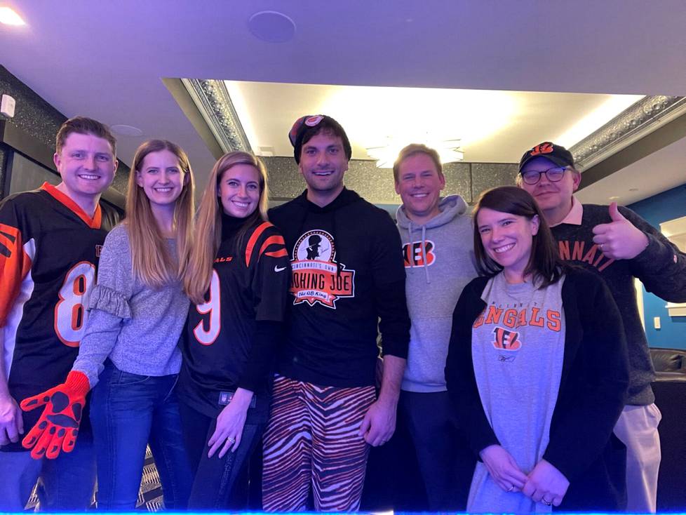 Adam Wolf (right) and other Bengals supporters in their first-round playoffs in Washington.  Because of superstition, they wear the same outfit in every match.