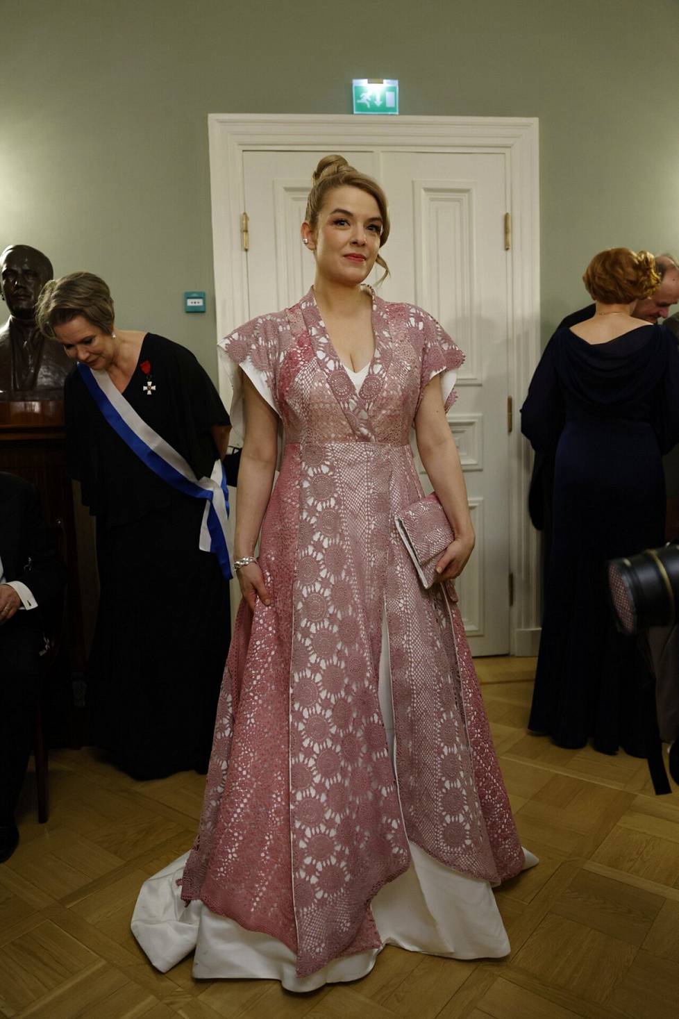 The lace on the dress of MP Mai Kivelä (left) was made by designer Paula Malleus' children's great-grandmother. 