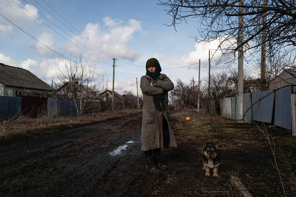 Galina Vasilyevna and her pet dog on Nevelskoy Street.