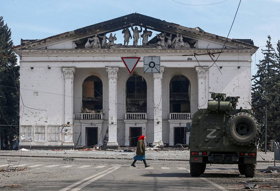 A Russian army car in front of a destroyed theater. Photo taken April 10th.