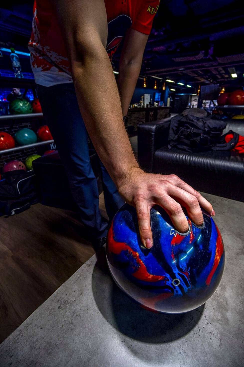 There are only two holes in a bowling ball.  There are three holes in a traditional ball.