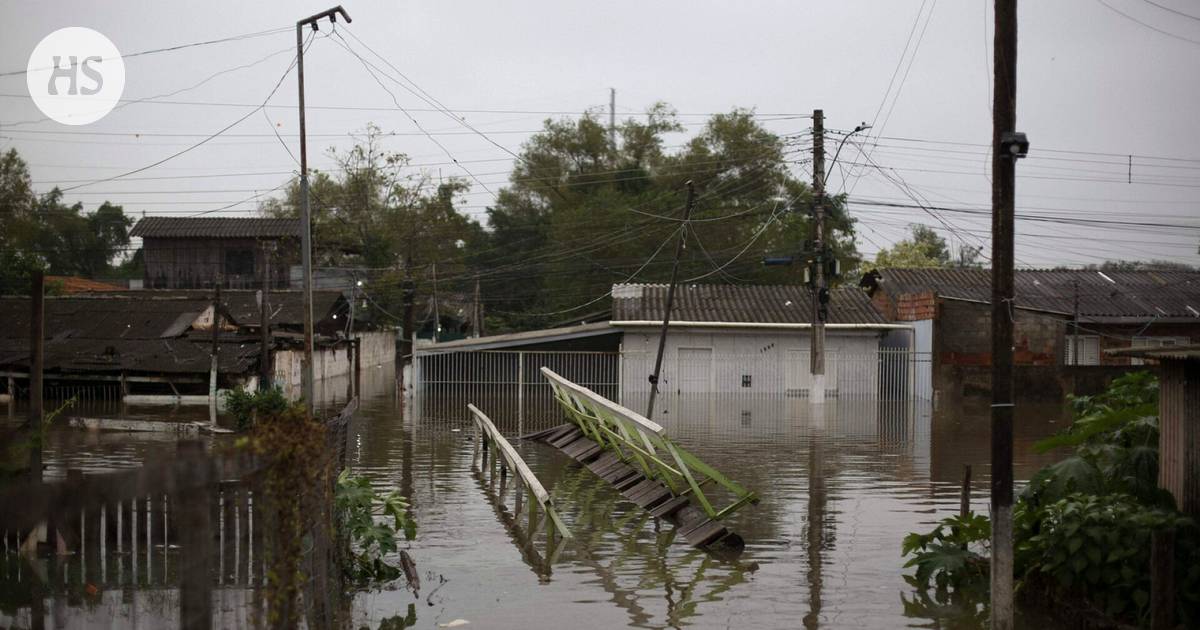 Huge volumes of water inundate residential areas, forcing nearly 100,000 people to evacuate